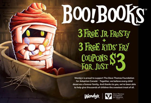 A cartoon mummy in a bathtub holds a coupon book. Text reads: Boo! Books: 3 free Jr. Frosty + 3 free kids fry coupons for just $3. Wendy’s and Dave Thomas Foundation for Adoption partnership logos are shown.